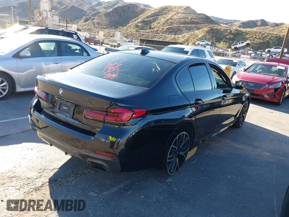2021 BMW 5 Series 530e with VIN WBA13AG09MCF52172, listed as a IAAI auction lot 41664307 with 72,454 mi miles and . Bid and sale history available at carsss.com. Image 4.