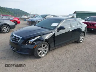 2014 Cadillac ATS Luxury AWD with VIN 1G6AH5RX2E0119821, listed as a IAAI auction lot 42670758 with 157,925 mi miles and . Bid and sale history available at DreamBid. Image 2.