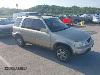 2000 Honda CR-V SE with VIN JHLRD1878YC048555, listed as a IAAI auction lot 42123556 with 164,934 mi miles. Bid and sale history available at carsss.com. Image 1.