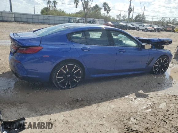 2023 BMW 8 Series M850i z VIN WBAGV8C08PCK41272, wystawiony jako Copart lot #77442574 z przebiegiem Nie podano mil oraz Szkoda całkowita • Salvage title. Historia ofert i sprzedaży dostępna na DreamBid. Obrazek 3.