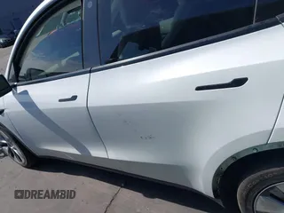 2021 Tesla Model Y Long Range with VIN 5YJYGDEE3MF081304, listed as a IAAI auction lot 41706240 with 90,510 mi miles and . Bid and sale history available at DreamBid. Image 14.