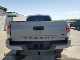 2020 Toyota Tacoma SR5 z VIN 3TMDZ5BN0LM094976, wystawiony jako Copart lot #58695515 z przebiegiem 84 025 mil mil oraz Czysty tytuł • Clean title. Historia ofert i sprzedaży dostępna na DreamBid. Obrazek 6.
