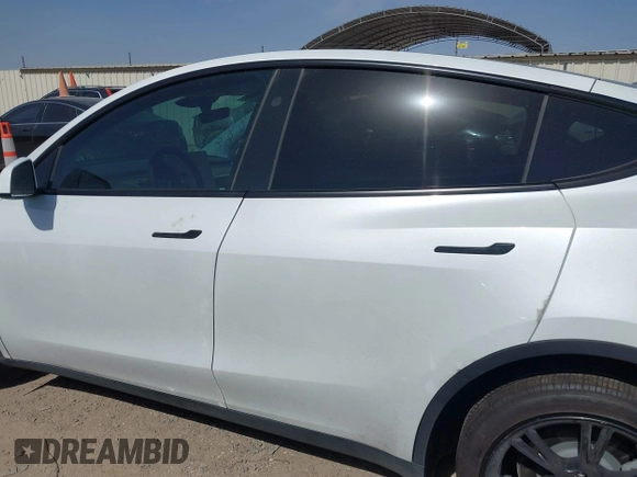 2024 Tesla Model Y with VIN 7SAYGDEDXRA300743, listed as a IAAI auction lot 41690374 with 12,446 mi miles and . Bid and sale history available at DreamBid. Image 15.