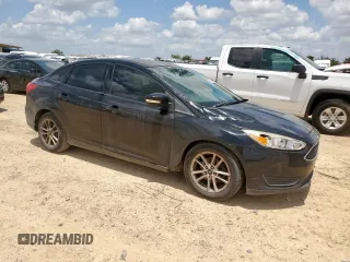 2016 Ford Focus SE with VIN 1FADP3F23GL271205, listed as a Copart auction lot 59395855 with 202,504 mi miles and Salvage title. Bid and sale history available at DreamBid. Image 4.