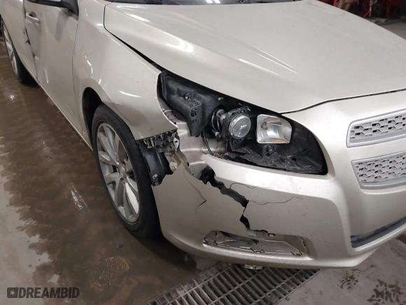 2013 Chevrolet Malibu LTZ with VIN 1G11H5SAXDF236151, listed as a IAAI auction lot 41720812 with 181,159 mi miles. Bid and sale history available at carsss.com. Image 6.