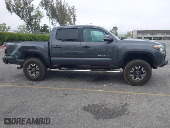 2018 Toyota Tacoma SR5 with VIN 3TMAZ5CN1JM071396, listed as a IAAI auction lot 42061640 with 122,148 mi miles and . Bid and sale history available at DreamBid. Image 13.