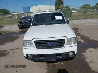 2009 Ford Ranger XLT with VIN 1FTYR44E89PA51577, listed as a IAAI auction lot 42000010 with 139,642 mi miles. Bid and sale history available at carsss.com. Image 6.
