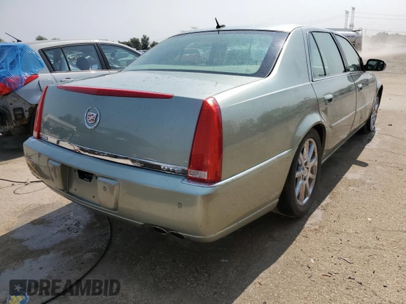 2007 Cadillac DTS Performance with VIN 1G6KD57987U138020, listed as a Copart auction lot 70678514 with 159,441 mi miles and Salvage Title. Bid and sale history available at DreamBid. Image 3.