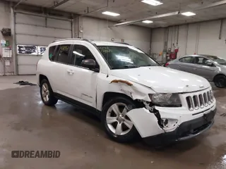 2016 Jeep Compass Sport with VIN 1C4NJDBB0GD571810, listed as a IAAI auction lot 41743860 with 99,649 mi miles. Bid and sale history available at carsss.com. Image 1.