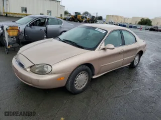 1996 Mercury Sable LS with VIN 1MELM53S0TA607489, listed as a Copart auction lot 85730734 with 113,214 mi miles and Salvage Title. Bid and sale history available at carsss.com. Image 1.