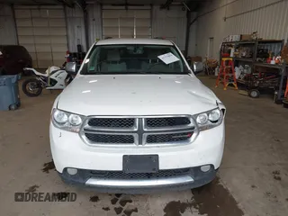 2012 Dodge Durango SXT with VIN 1C4RDJAGXCC295138, listed as a IAAI auction lot 42333094 with 96,581 mi miles and . Bid and sale history available at DreamBid. Image 12.