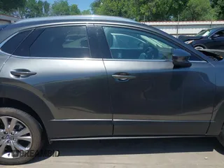 2022 Mazda CX-30 S Premium with VIN 3MVDMBDL5NM416649, listed as a IAAI auction lot 41990745 with 13,923 mi miles and . Bid and sale history available at DreamBid. Image 14.
