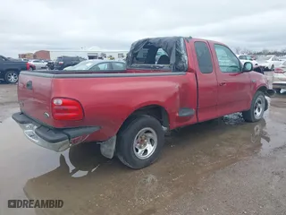 2000 Ford F-150 Work Series with VIN 1FTRX07W2YKA56826, listed as a IAAI auction lot 41527865 with 1 mi miles. Bid and sale history available at carsss.com. Image 4.