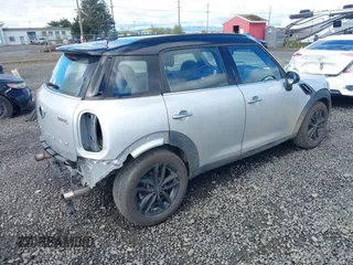 2014 MINI Countryman S z VIN WMWZC3C56EWP26003, wystawiony jako IAAI lot #41884630 z przebiegiem 101 683 mil mil oraz . Historia ofert i sprzedaży dostępna na DreamBid. Obrazek 4.