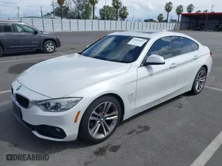 2016 BMW 4 Series 428i with VIN WBA4A9C51GGL88011, listed as a IAAI auction lot 41852057 with 117,669 mi miles. Bid and sale history available at carsss.com. Image 2.