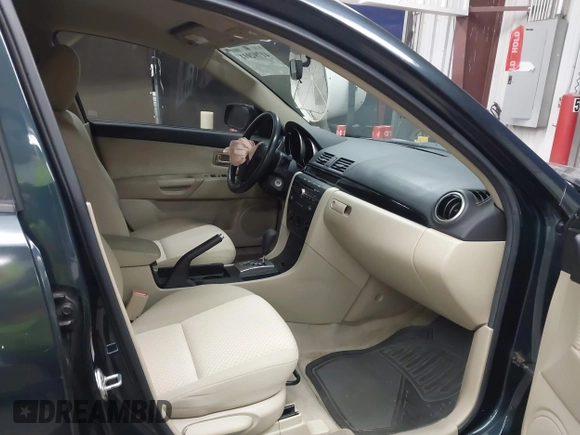 2006 Mazda 3 i Touring with VIN JM1BK32F061431107, listed as a IAAI auction lot 41792011 with 189,533 mi miles and . Bid and sale history available at DreamBid. Image 5.