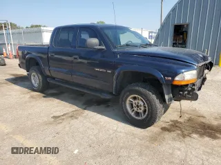 2000 Dodge Dakota Sport with VIN 1B7GG2AN8YS665678, listed as a Copart auction lot 63878554 with 92,470 mi miles and Salvage Title. Bid and sale history available at carsss.com. Image 4.