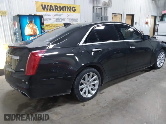2015 Cadillac CTS Performance AWD with VIN 1G6AY5S30F0109507, listed as a IAAI auction lot 41609798 with 84,846 mi miles and . Bid and sale history available at DreamBid. Image 4.