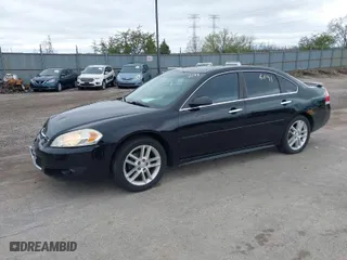 2013 Chevrolet Impala LTZ with VIN 2G1WC5E33D1129273, listed as a IAAI auction lot 42086191 with 206,340 mi miles. Bid and sale history available at carsss.com. Image 2.