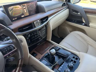 2016 Lexus LX 570 with VIN JTJHY7AX4G4198811, listed as a Copart auction lot 64898475 with 107,759 mi miles and Clean title. Bid and sale history available at DreamBid. Image 11.