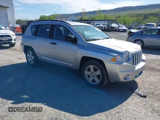 2008 Jeep Compass Sport with VIN 1J8FT47088D784150, listed as a IAAI auction lot 42122964 with 241,302 mi miles. Bid and sale history available at carsss.com. Image 1.