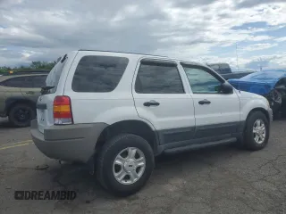 2003 Ford Escape XLT Popular 2 with VIN 1FMYU93133KD76423, listed as a Copart auction lot 57780455 with 98,779 mi miles and Salvage title. Bid and sale history available at DreamBid. Image 3.