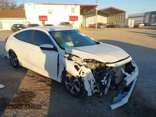 2019 Honda Civic LX with VIN 19XFC2F61KE014007, listed as a IAAI auction lot 41795070 with 64,259 mi miles and . Bid and sale history available at DreamBid. Image 1.