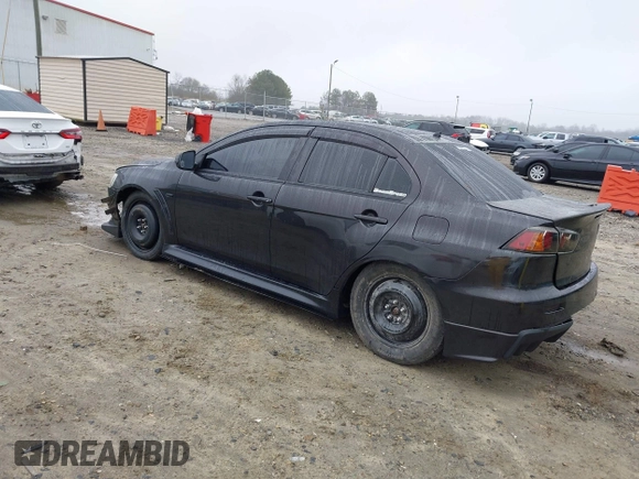 2010 Mitsubishi Lancer Evolution GSR with VIN JA32W8FV1AU012725, listed as a IAAI auction lot 41542629 with 124,347 mi miles and . Bid and sale history available at DreamBid. Image 3.