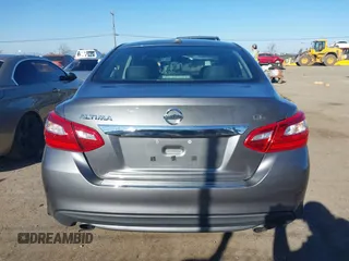 2016 Nissan Altima SV with VIN 1N4AL3AP7GC147035, listed as a IAAI auction lot 41419451 with 104,810 mi miles and . Bid and sale history available at DreamBid. Image 16.