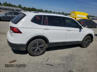 2019 Volkswagen Tiguan SE with VIN 3VV2B7AX5KM009947, listed as a Copart auction lot 54951455 with 90,569 mi miles and Salvage Title. Bid and sale history available at DreamBid. Image 3.