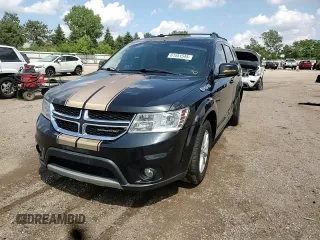 2013 Dodge Journey SXT with VIN 3C4PDCBG9DT619557, listed as a Copart auction lot 61551545 with 159,950 mi miles and Salvage title. Bid and sale history available at DreamBid. Image 13.