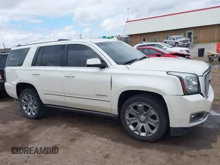 2015 GMC Yukon Denali with VIN 1GKS2CKJ7FR737165, listed as a IAAI auction lot 41914478 with 156,059 mi miles. Bid and sale history available at carsss.com. Image 13.