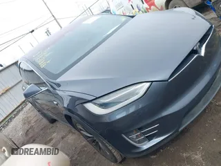 2018 Tesla Model X 75D with VIN 5YJXCBE22JF099970, listed as a IAAI auction lot 41821514 with 119,310 mi miles and . Bid and sale history available at carsss.com. Image 1.
