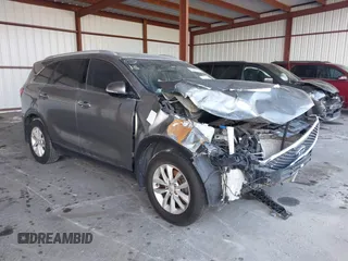 2018 Kia Sorento L with VIN 5XYPG4A37JG414012, listed as a IAAI auction lot 41486456 with 165,262 mi miles. Bid and sale history available at carsss.com. Image 1.