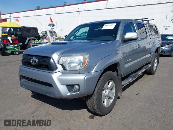 2014 Toyota Tacoma with VIN 3TMLU4EN7EM146705, listed as a IAAI auction lot 41949827 with 147,887 mi miles and . Bid and sale history available at DreamBid. Image 17.
