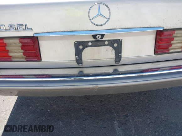 1989 Mercedes-Benz 560 with VIN WDBCA39D7KA436793, listed as a IAAI auction lot 42190980 with 141,165 mi miles and . Bid and sale history available at DreamBid. Image 14.