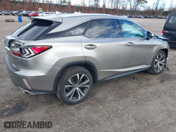 2019 Lexus RX 350 with VIN 2T2BZMCA4KC208459, listed as a IAAI auction lot 41141438 with 39,349 mi miles and . Bid and sale history available at DreamBid. Image 4.