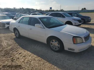 2002 Cadillac DeVille with VIN 1G6KD54YX2U104701, listed as a Copart auction lot 74187264 with 205,805 mi miles and Salvage Title. Bid and sale history available at carsss.com. Image 4.