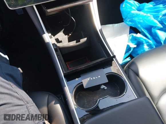 2018 Tesla Model 3 Long Range Battery with VIN 5YJ3E1EB5JF146184, listed as a IAAI auction lot 41808346 with 97,496 mi miles and . Bid and sale history available at DreamBid. Image 11.