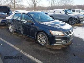 2018 Volkswagen Passat 2.0T SE with VIN 1VWBA7A33JC009425, listed as a IAAI auction lot 41362076 with 89,673 mi miles. Bid and sale history available at carsss.com. Image 1.