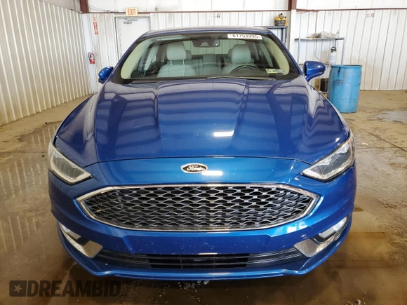 2017 Ford Fusion Titanium z VIN 3FA6P0D99HR162354, wystawiony jako Copart lot #61753395 z przebiegiem 100 678 mil mil oraz Szkoda całkowita • Salvage title. Historia ofert i sprzedaży dostępna na DreamBid. Obrazek 5.