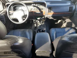 1997 Jeep Grand Cherokee Limited with VIN 1J4GZ78Y4VC568288, listed as a Copart auction lot 88265025 with 185,015 mi miles and Salvage Title. Bid and sale history available at carsss.com. Image 8.
