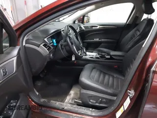 2015 Ford Fusion SE with VIN 3FA6P0HD2FR245023, listed as a IAAI auction lot 41632507 with 112,389 mi miles. Bid and sale history available at carsss.com. Image 5.