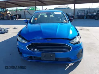 2020 Ford Fusion SE with VIN 3FA6P0H77LR153539, listed as a IAAI auction lot 42054318 with 103,820 mi miles and . Bid and sale history available at DreamBid. Image 13.