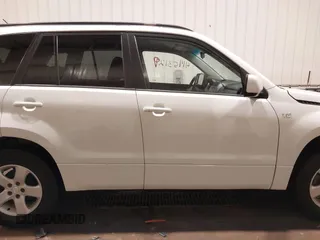 2006 Suzuki Grand Vitara Premium with VIN JS3TD943664100584, listed as a IAAI auction lot 41453129 with 159,220 mi miles and . Bid and sale history available at DreamBid. Image 13.