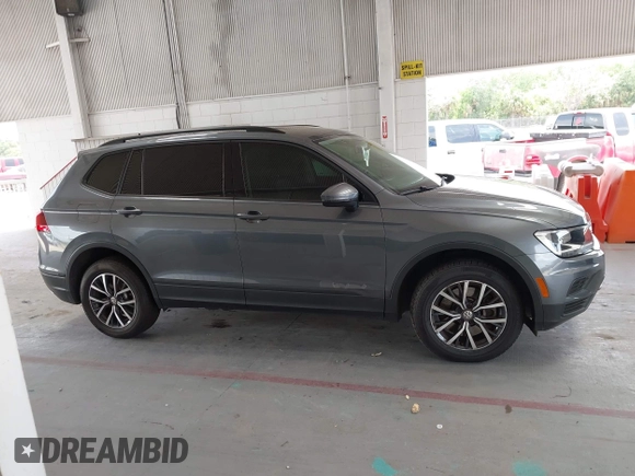 2021 Volkswagen Tiguan S z VIN 3VV1B7AX0MM030915, wystawiony jako IAAI lot #42198262 z przebiegiem 47 500 mil mil oraz . Historia ofert i sprzedaży dostępna na DreamBid. Obrazek 13.