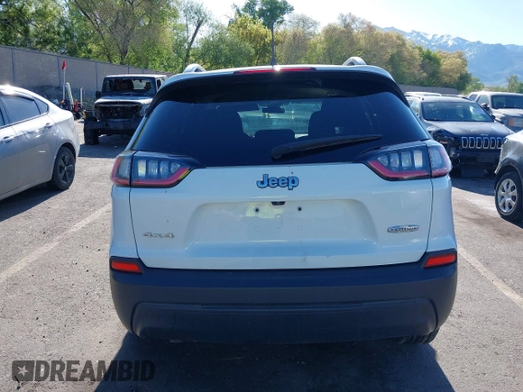 2020 Jeep Cherokee Latitude with VIN 1C4PJMCB0LD502665, listed as a IAAI auction lot 42165000 with 65,159 mi miles and . Bid and sale history available at DreamBid. Image 16.