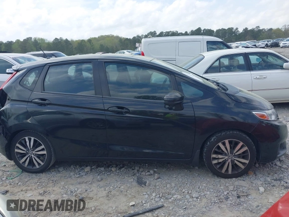 2015 Honda Fit EX-L with VIN 3HGGK5H83FM770734, listed as a IAAI auction lot 41936962 with 132,478 mi miles. Bid and sale history available at carsss.com. Image 13.