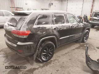 2016 Jeep Grand Cherokee Laredo with VIN 1C4RJFAGXGC311561, listed as a IAAI auction lot 41364024 with 134,042 mi miles. Bid and sale history available at carsss.com. Image 4.