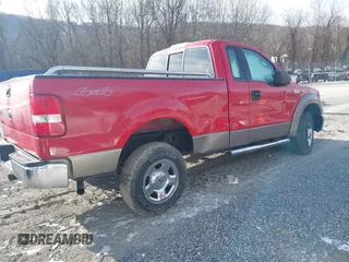 2005 Ford F-150 XL with VIN 1FTRF14W05NA77908, listed as a IAAI auction lot 41382643 with 128,135 mi miles. Bid and sale history available at carsss.com. Image 4.